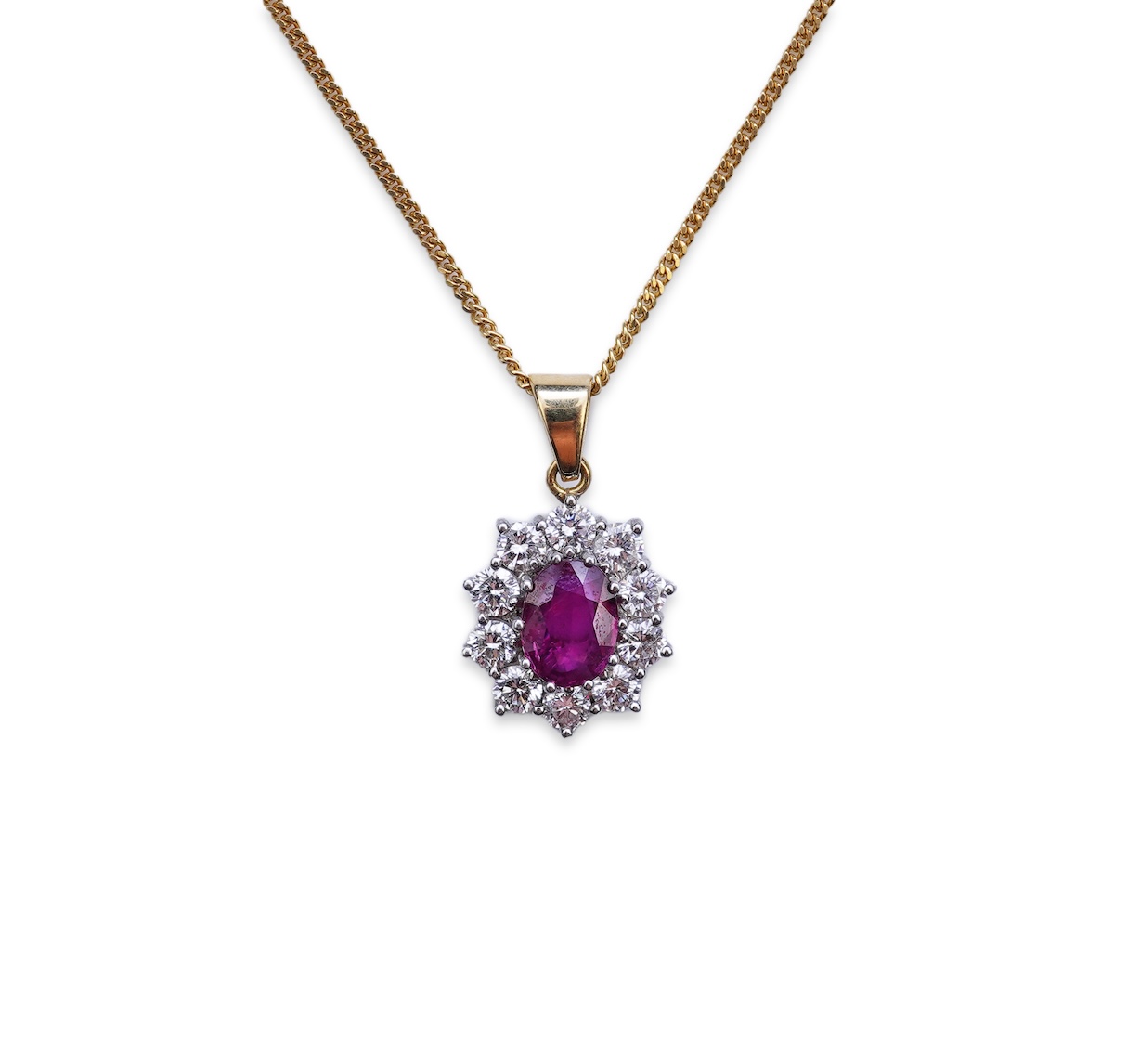 A ruby and diamond pendant